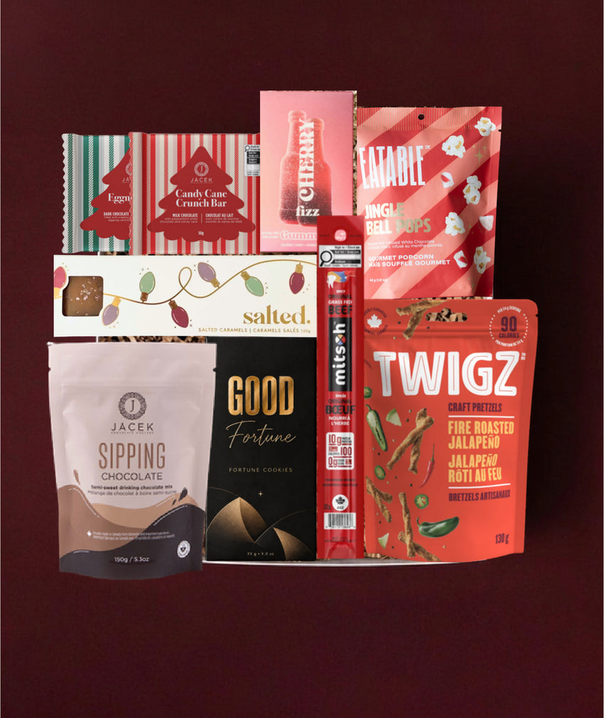 The Holiday Foodie gift selection with JACEK chocolate, Vesper Candy gummies, Salted caramels, popcorn, pretzels and jerky.
