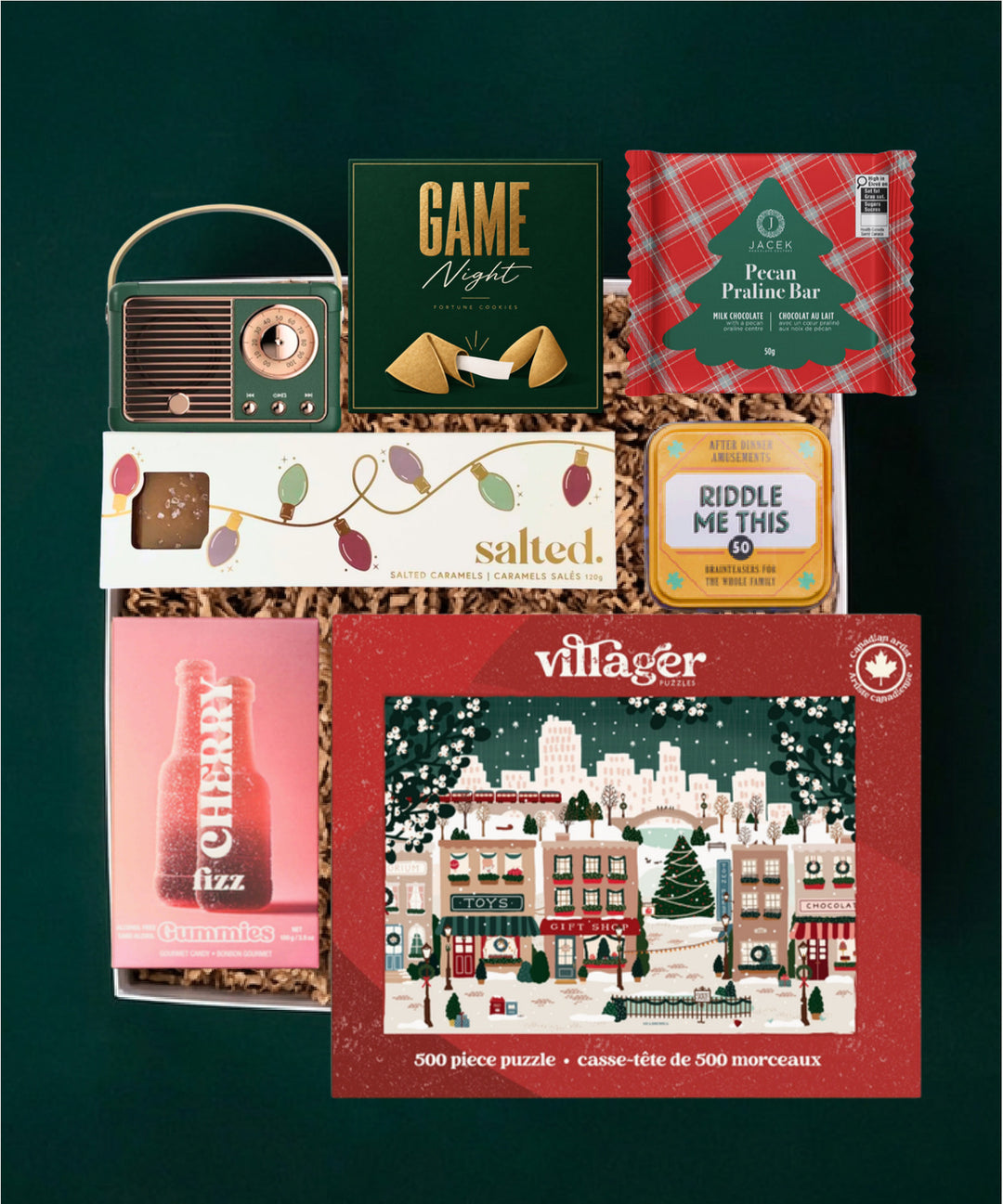 Game Night gift selection with a retro radio, Villager puzzle, riddles, JACEK chocolate, Salted caramels and Vesper Candy gummies.