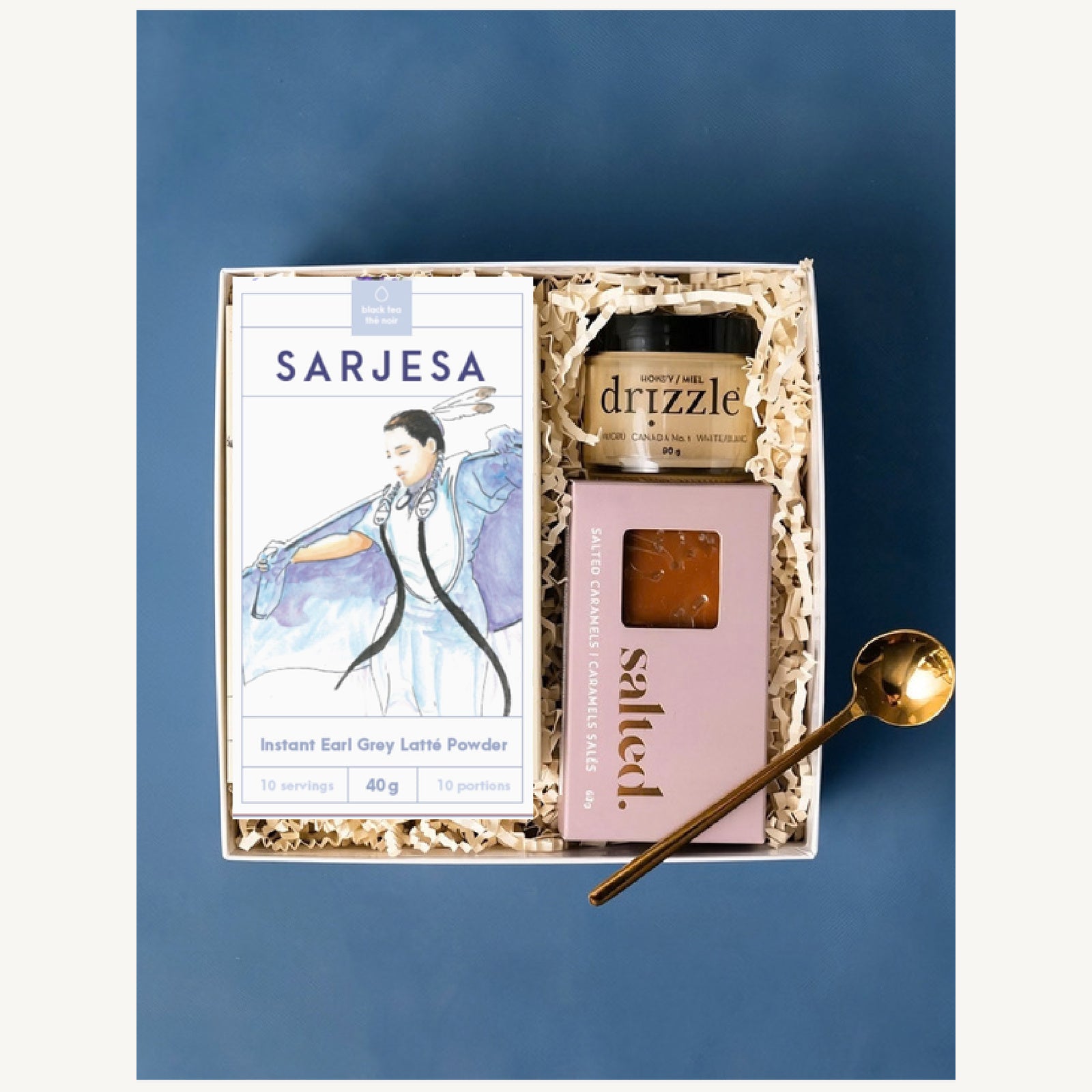 Rest & Refuel gift box with Sarjesa Earl Grey latte, Drizzle honey, Salted caramels and a golden spoon.