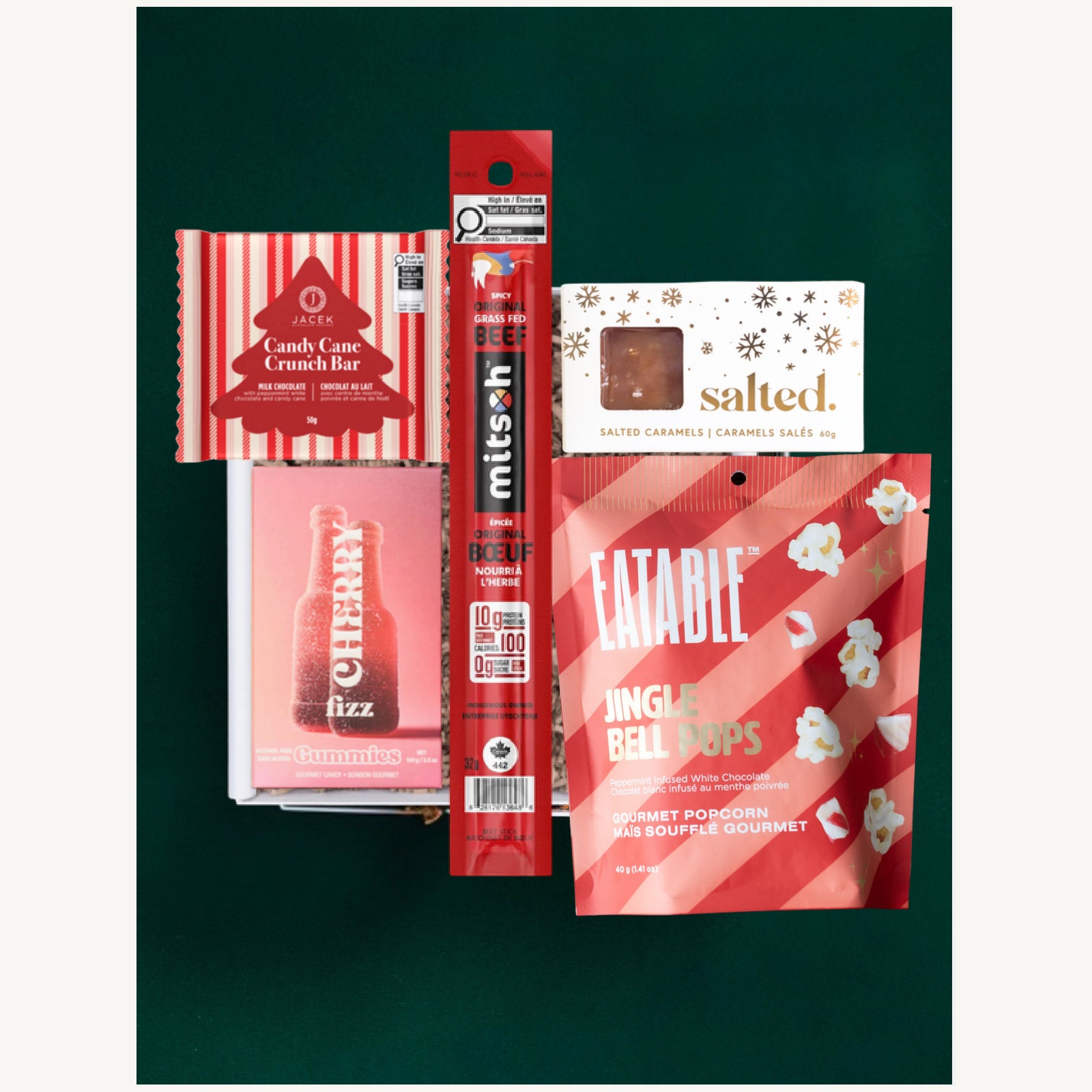Tis the Season gift selection with JACEK candy cane chocolate, Salted caramels, Vesper Candy gummies, Eatable popcorn and Mitsoh jerky.